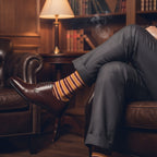 Man wearing Autumn Horizon Stripes socks