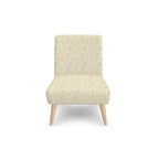 Vintage Elegance Perfume Bottles Dressing chair Beige armchair with wooden legs on a white background